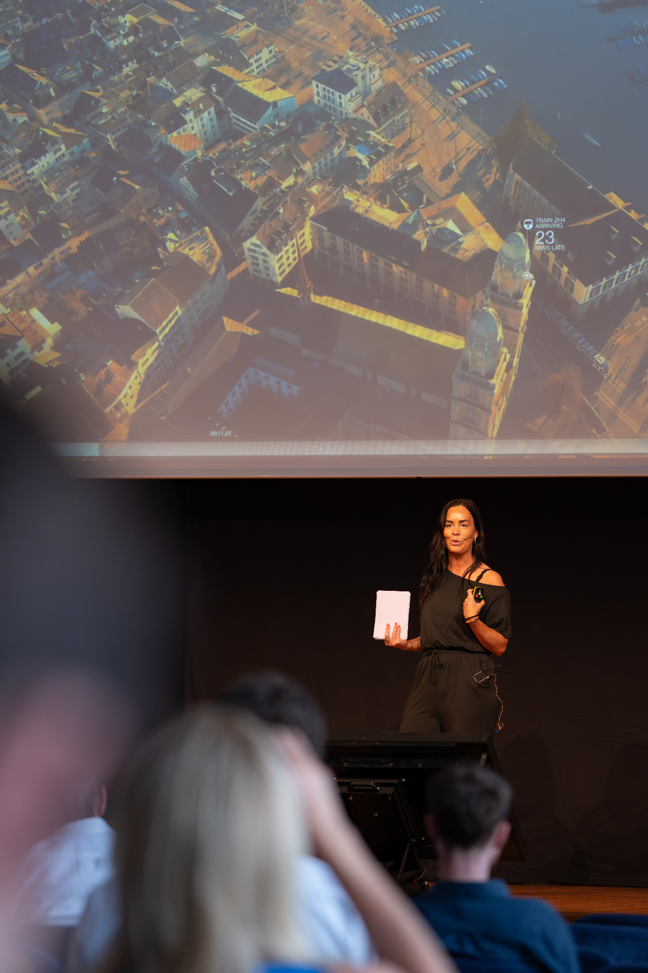 Taisha Fabricius speaking on stage